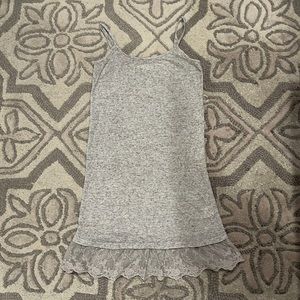 Gray tank top with lace detail.